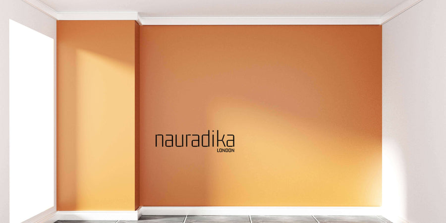 Orange wall showcasing using different shades of the same color creates depth and interest in interior design.