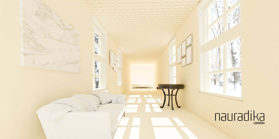 Bright monochromatic room showcasing the use of a monochromatic color scheme in interior design with white and cream elements.
