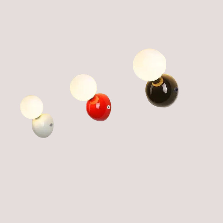 70s revival wall lamp in 3 different colours featuring a painted metal base and frosted glass balls.