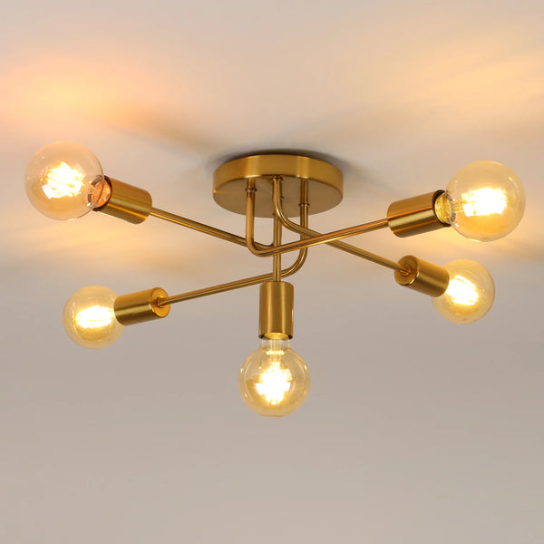 Hero Modern Gold 5-Light Sputnik Ceiling Light with a gold brass finish and five exposed filament light bulbs, shown illuminated against a neutral ceiling background.