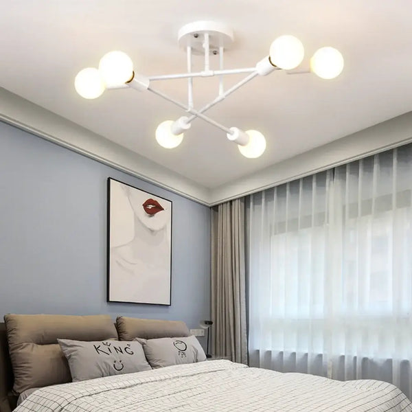 Mad Men Inspired Ceiling Lights in a modern bedroom with white ceiling and soft furnishings.