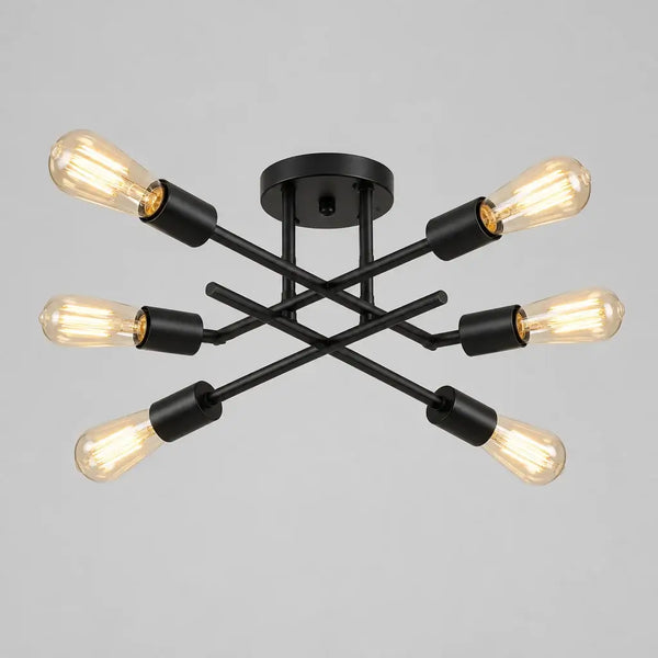 Black sputnik ceiling light, mid-century modern, with exposed Edison-style bulbs in a bright living room