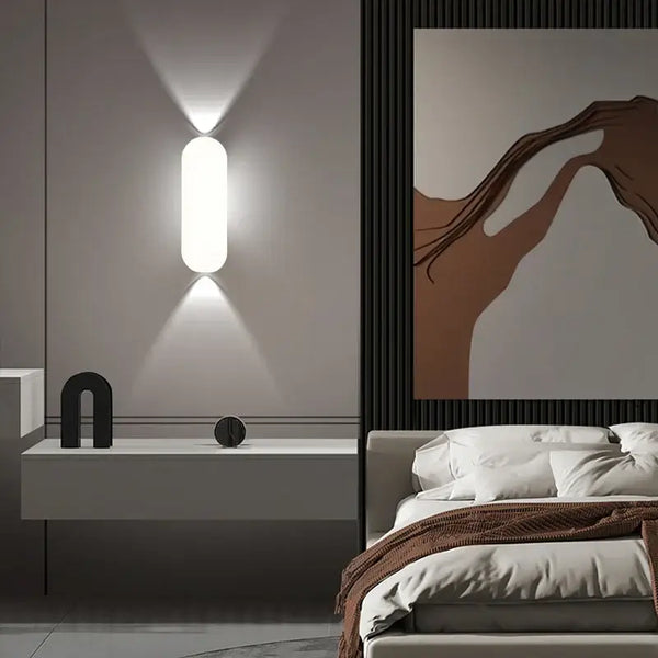 Aluminum Outdoor Modern Nordic Dimmable Wall Lamp illuminating a stylish bedroom with minimalist decor.