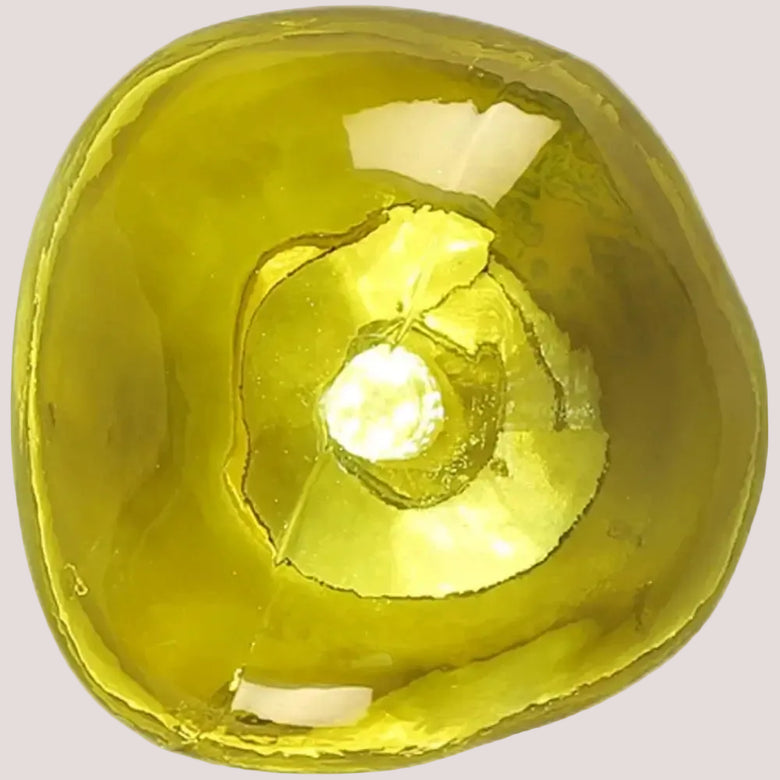 Close-up of a vibrant yellow Lava Glass Wall Lamp showcasing its unique texture and design.