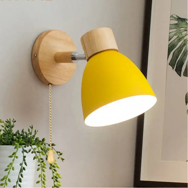 Modern Sconce With Switch featuring a yellow shade and wooden mount, ideal for contemporary decor.