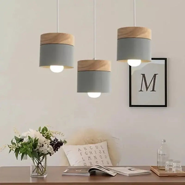 Simple Metal Danish Pendant with Wood in a modern interior, featuring gray and wood accents for elegant lighting.