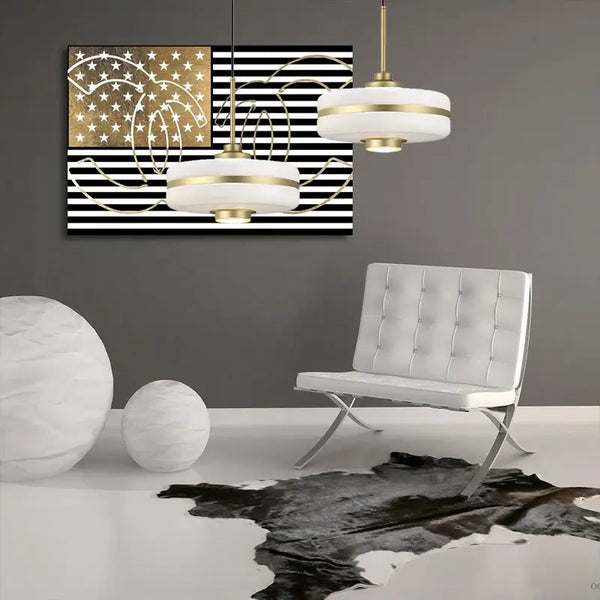 Milky Glass Gold Art Deco pendant light hanging in modern living room with abstract art and minimalist furniture.