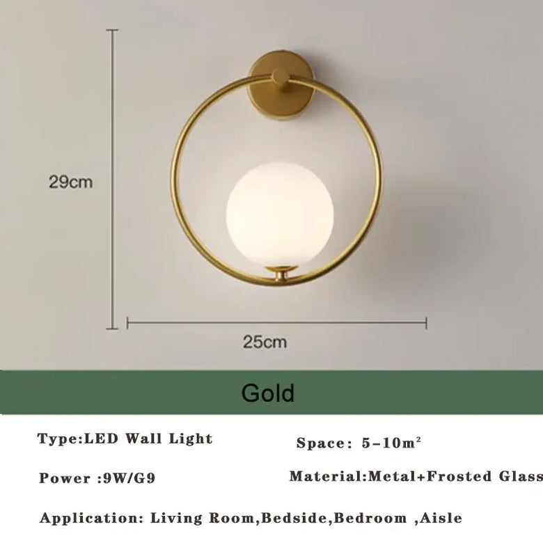 Art Deco Golden Circle Sconce featuring a gold LED wall light design with a frosted glass globe.