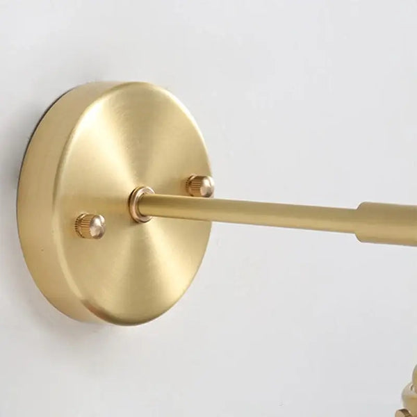 Timeless Elegance: Nordic White Porcelain Wall Lamp close-up of gold mount detail.