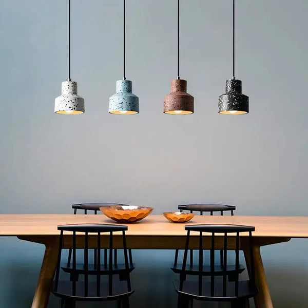 Contemporary Hanging Lights featuring modern Nordic design with colorful lampshades over a dining table.