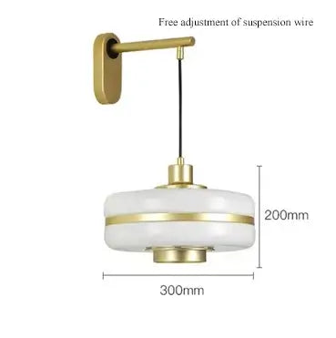 Milky Glass Gold Art Deco pendant light with brass detailing and adjustable suspension wire.