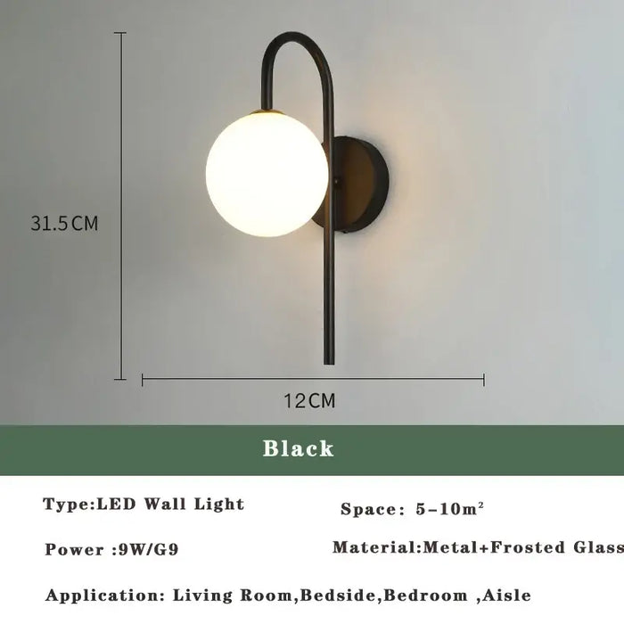 Art Deco Golden Circle Sconce featuring a modern LED wall light design with a black finish and frosted glass.