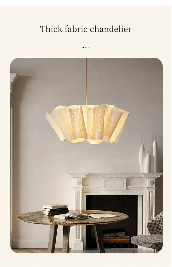 Off-White Pendant Light made from Natural Plant Fiber hanging above a dining table in an elegant interior.
