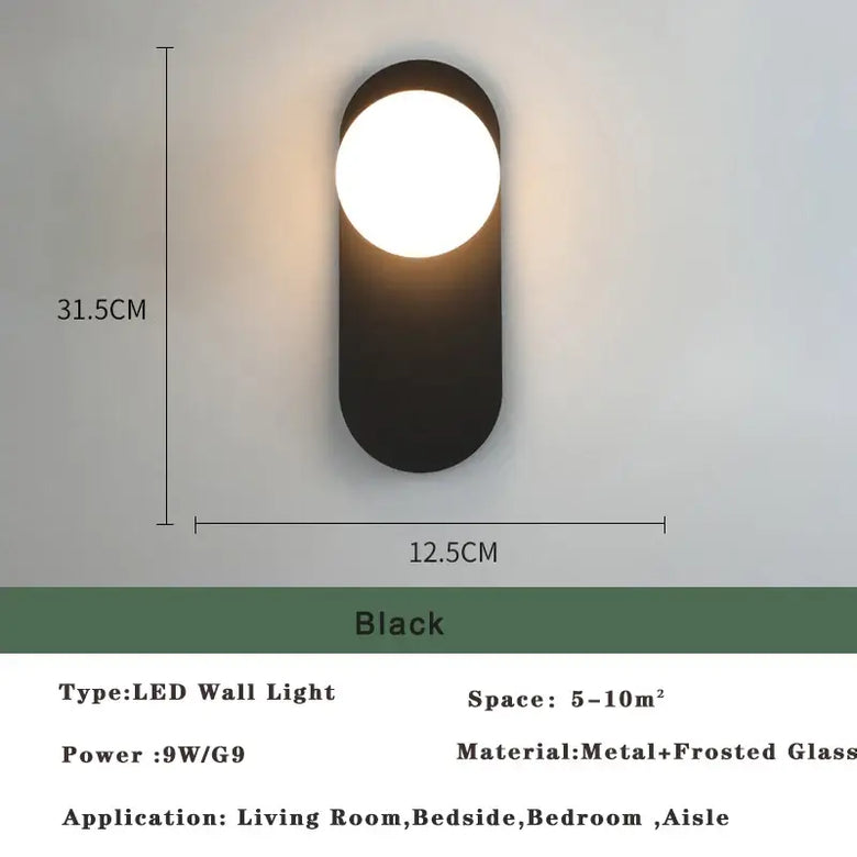 Art Deco Golden Circle Sconce in black, LED wall light with frosted glass, perfect for living room or bedroom.