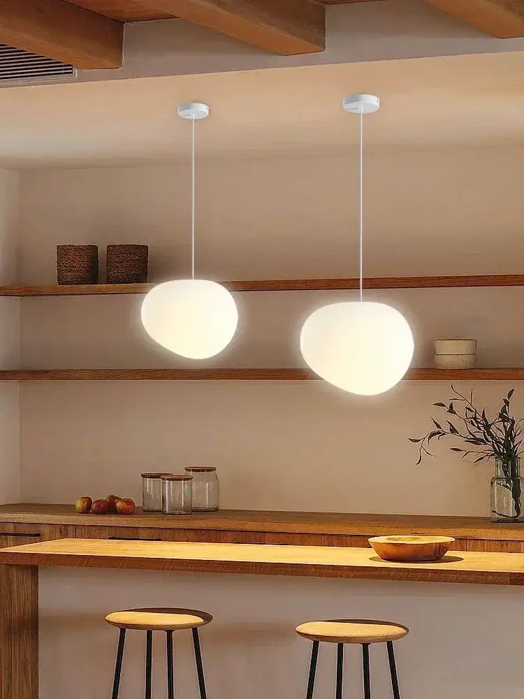 Simple Nordic Restaurant Pebble Chandelier in a modern kitchen setting with minimalist decor.