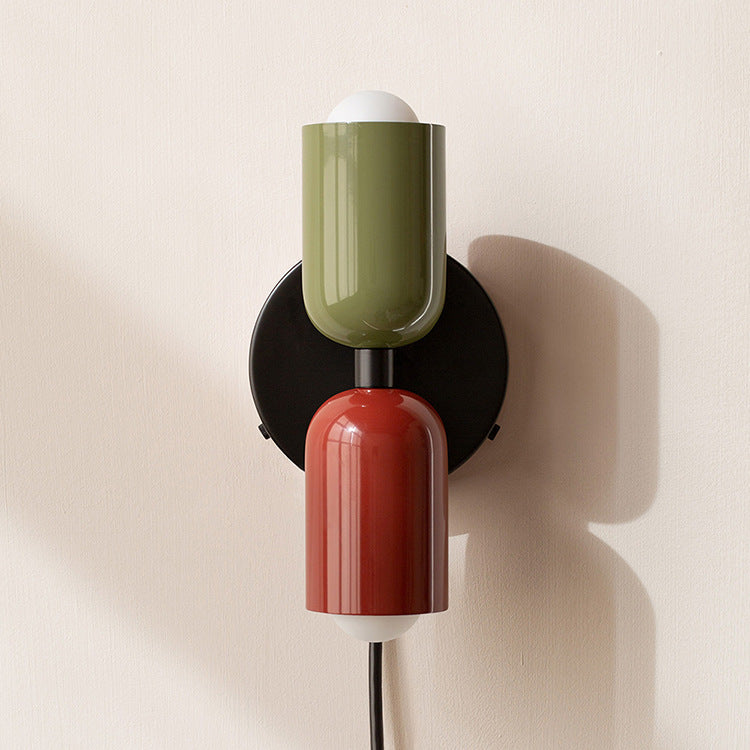 Postmodern Two-Tone Pill Wall Sconce, on black plate