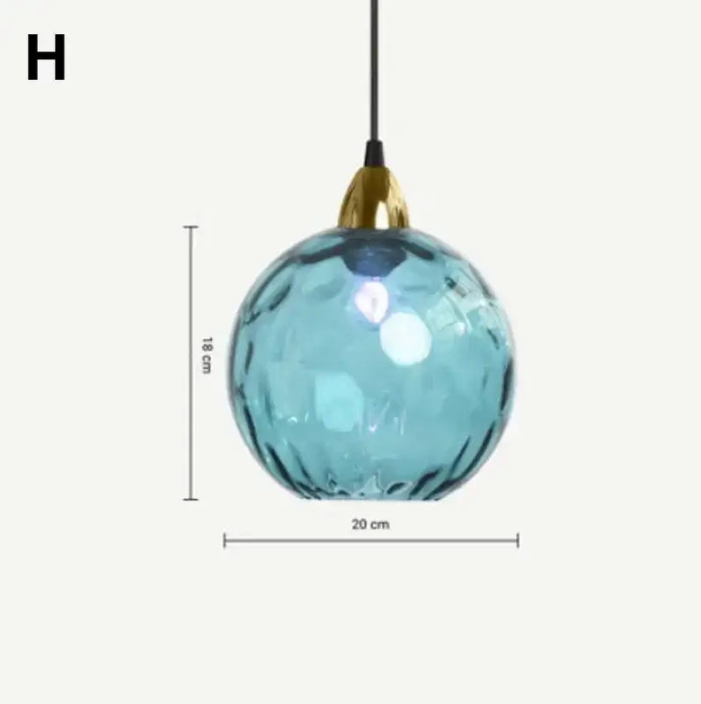 Delicious Lollipop Modern Pendant Light features a vibrant blue glass ball measuring 20cm with a gold fixture.