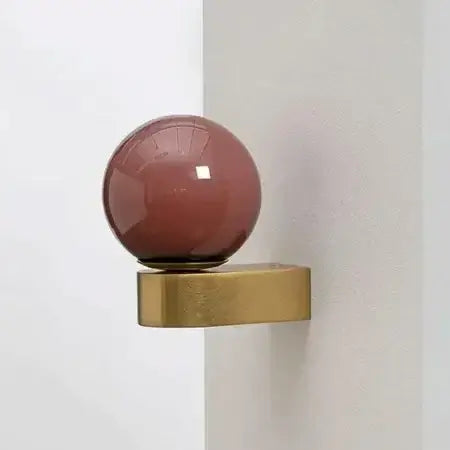 Chic Dual Bubble Wall Light - Modern & Versatile Lighting featuring polished brass and a colorful glass ball.