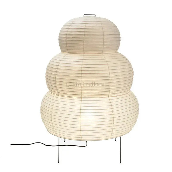 Japanese White Rice Paper Table Lamp with unique shape and warm lighting, ideal for cozy interiors.