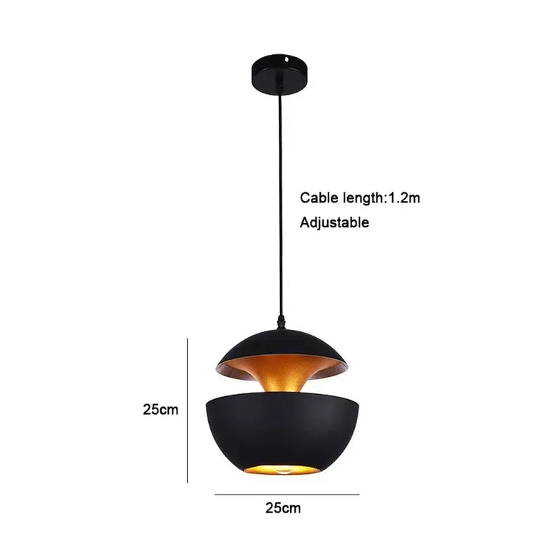 Kitchen Island Scandi Pendants featuring a modern black pendant lamp with adjustable cable and gold accent.