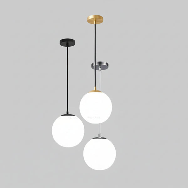 hero Modern pendant light with three spherical white shades on a plain background