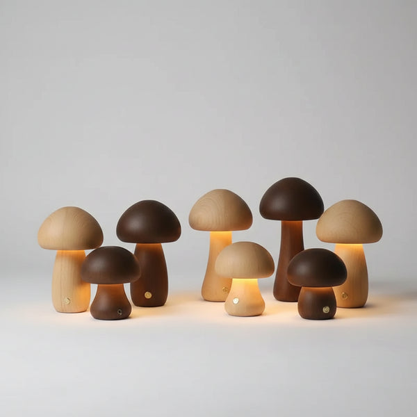 Portable Dimmable 60s Italy Designer Mushroom Table Lamp collection on a shelf, showcasing various styles and warm glow.