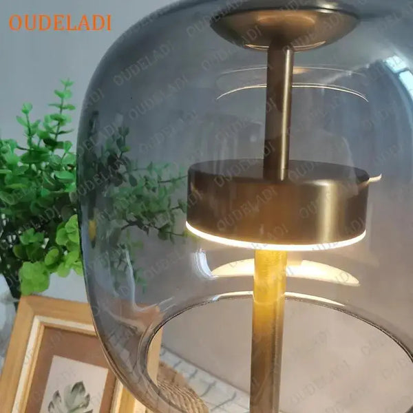Czech Design Desk Lamps with Glass Shade illuminating a stylish interior with a unique transparent design.