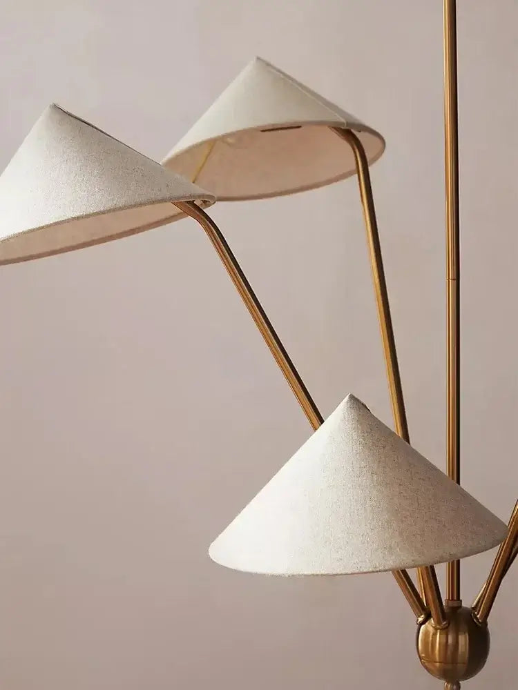 Chic Japansese Mid-Century Modern Ceiling Pendant featuring golden rods and elegant fabric shades.