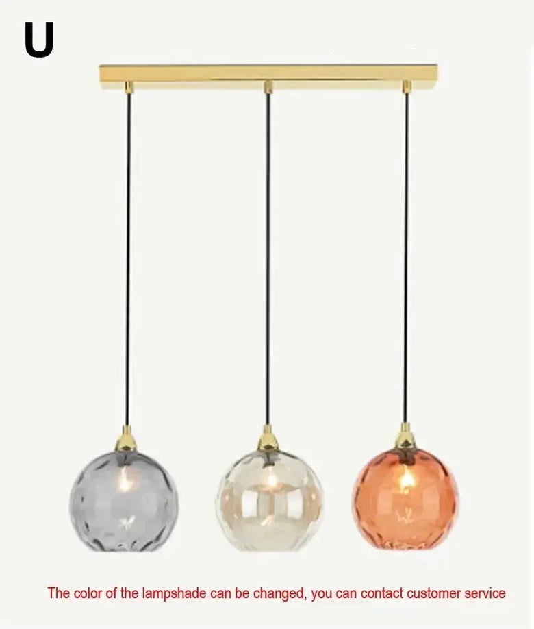 Delicious Lollipop Modern Pendant Light with three colorful glass balls in a sleek design.