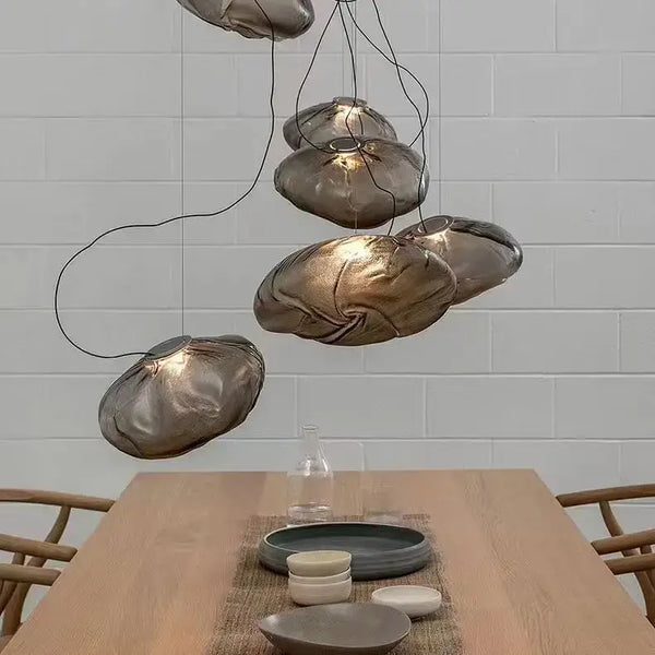 Nordic Cloud Glass Pendant Light – Smoky Grey Designer LED Chandelier hanging over a wooden dining table.