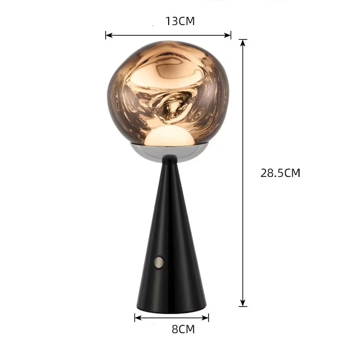A modern table lamp with a reflective metallic gold globe shade and a tapered black base, shown with dimension labels indicating a diameter of 13 cm at the top, a height of 28.5 cm, and a base diameter of 8 cm.