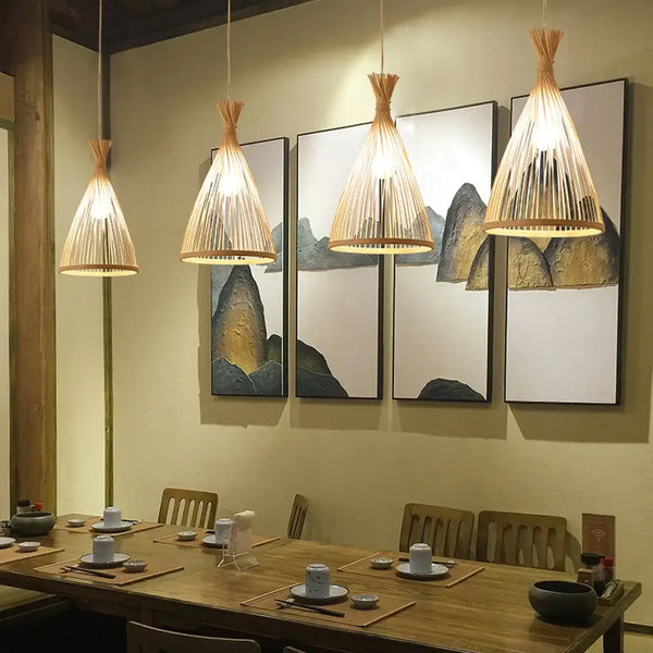 Simple Wicker lamp shade hanging over a dining table in a beautifully decorated room.