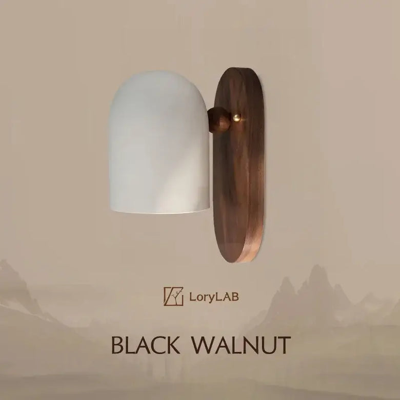 Elegant Walnut Wood and Iron Wall Lamp showcasing a modern Wabi-Sabi design in a stylish setting.