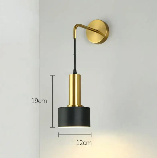 Gold Wall Mounted Spot in Brass and Black Colours with measurements 19cm height and 12cm width.