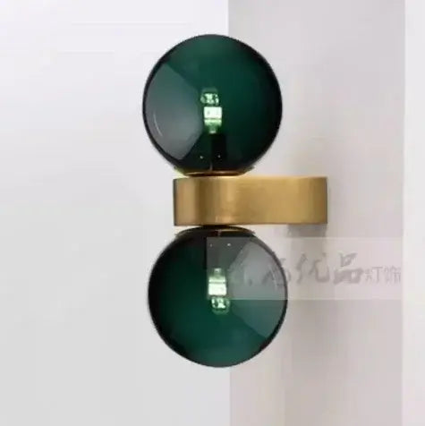 Chic Dual Bubble Wall Light - Modern & Versatile Lighting showcasing polished brass and colorful glass balls.