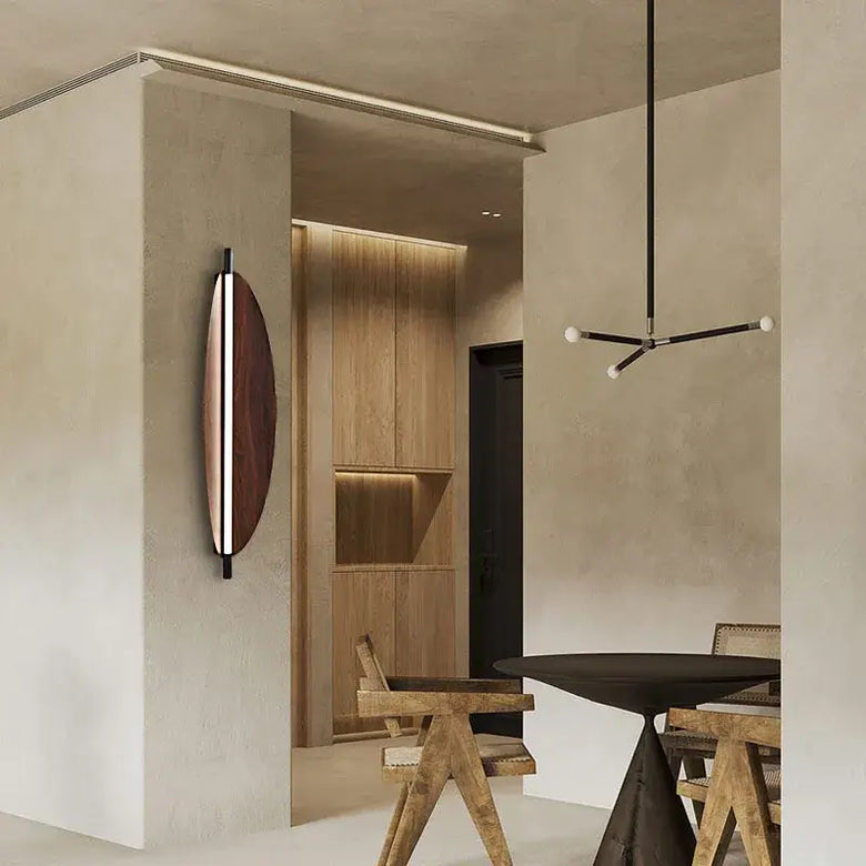 Modern Brown Leaf Wall Light – Sculptural LED Wall Sconce in Metal adorning a stylish interior.