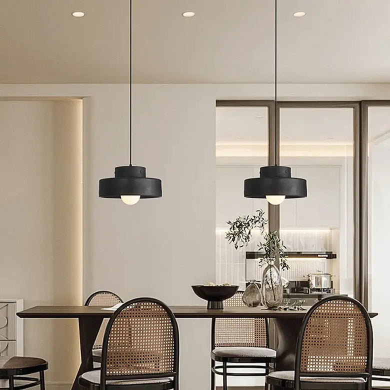 Illuminate Your Space with the Minimalist Nordic Resin Pendant Light in a modern dining setting.