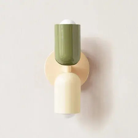 Classic Midcentury Modern Wall Lamp (10x25cm) with green and cream colors on a wall