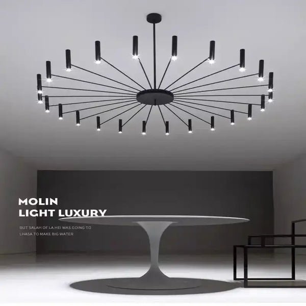 Modern Starburst LED Chandelier – 24-Light Sculptural Ceiling Statement in sleek black finish above a modern table.
