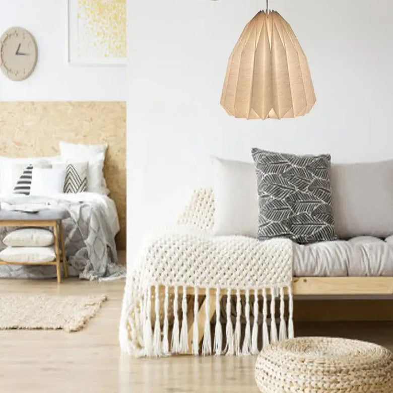 Elegant Origami-Inspired Paper Lantern illuminating a cozy living room with modern decor.