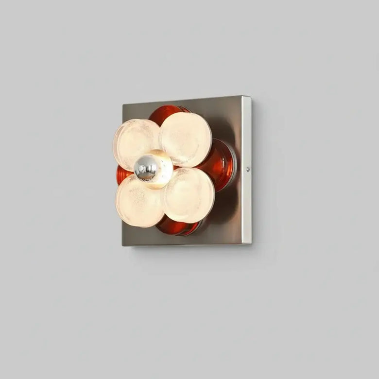 hero Modern wall light fixture with glass shades on a neutral background