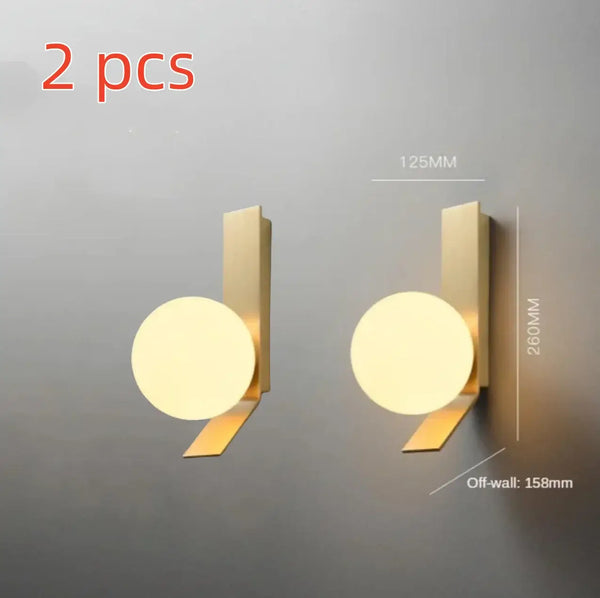 Contemporary Golden Wall Lamp with Glass Ball, set of 2, showcasing modern design and dimensions.