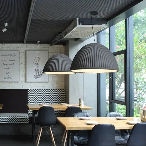 Italian Designer Felt Pendant Light – Sculptural Dome for Dining Rooms and Kitchens in a modern dining space.