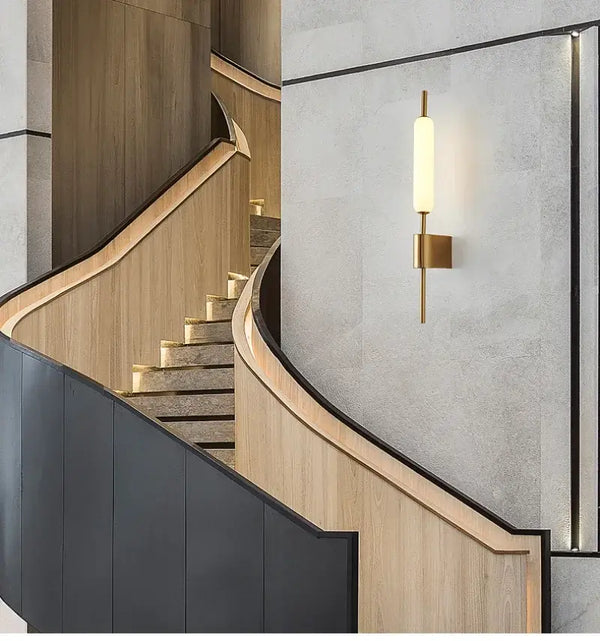Lollipop Art Deco Wall Light Fixture illuminating a stylish staircase with modern architectural design.