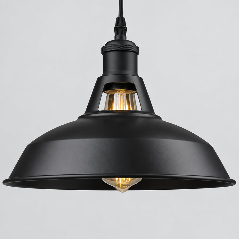 Hero - Black industrial pendant light on a grey background