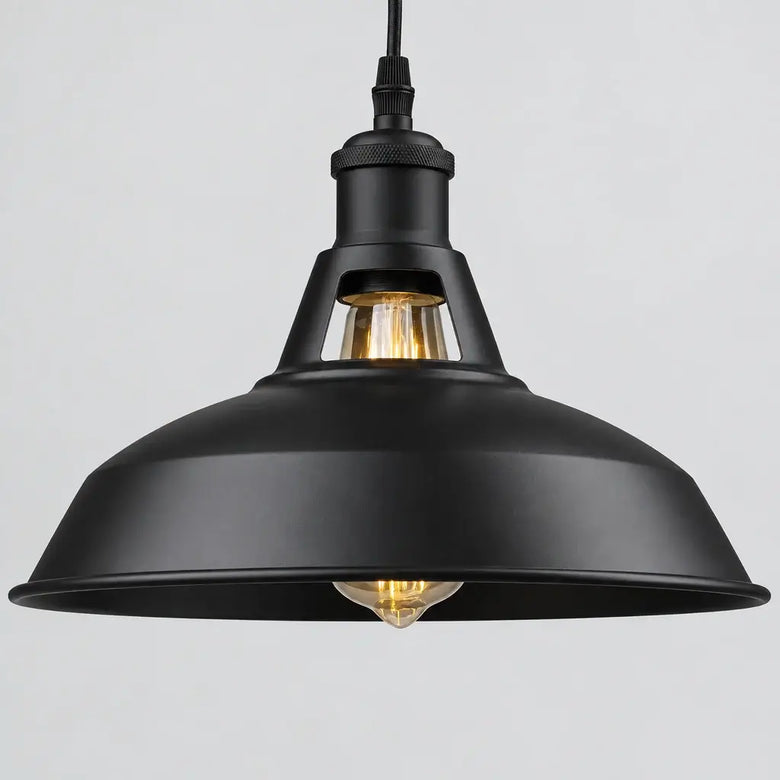 Hero - Black industrial pendant light on a grey background