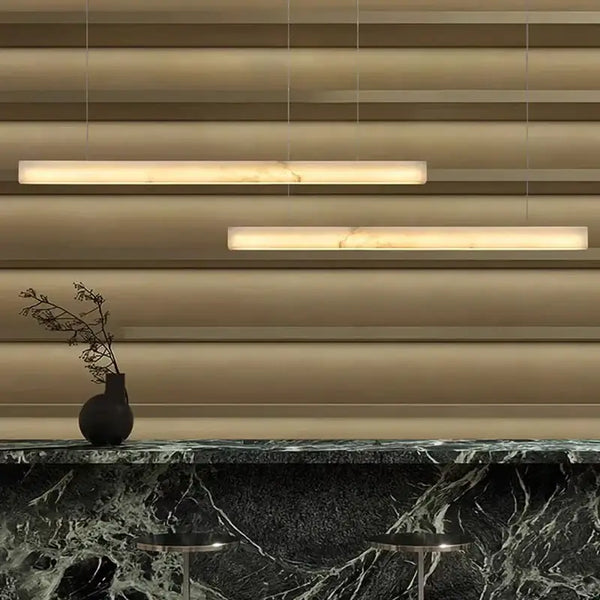 Natural Marble Linear Pendant Light 80–120cm illuminating a stylish kitchen bar.