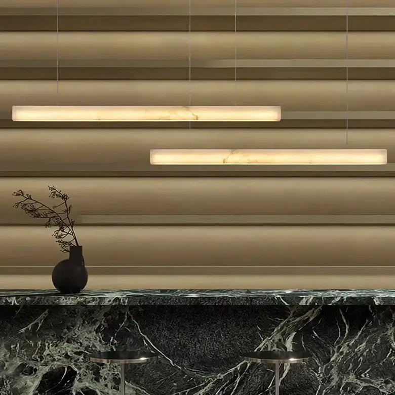 Natural Marble Linear Pendant Light 80–120cm illuminating a stylish kitchen bar.