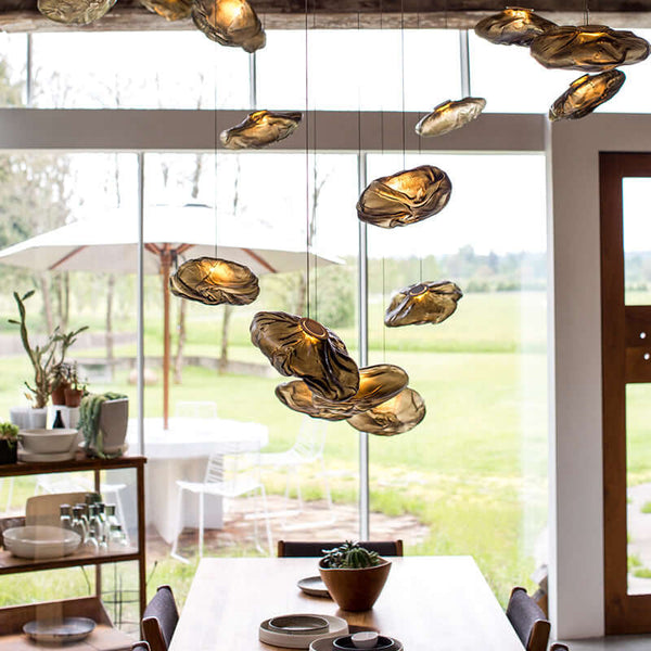 Nordic Cloud Glass Pendant Light – Smoky Grey Designer LED Chandelier illuminating a modern dining space.