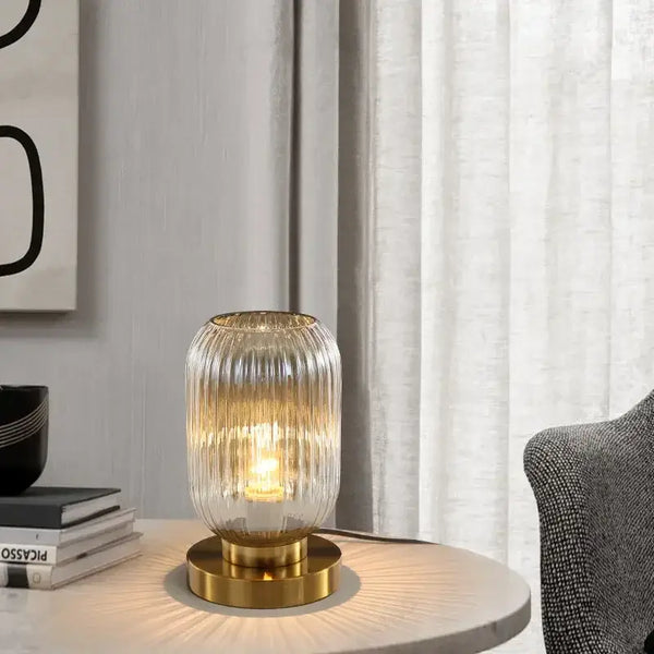 Modern Nordic Glass Table Lighting Fixtures on a stylish table beside curtains.